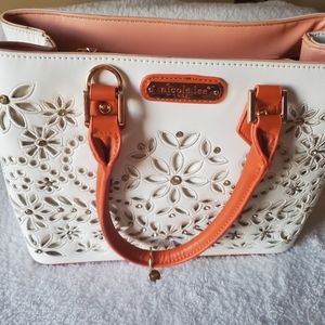 Nicole Lee White Laser- cut tote.